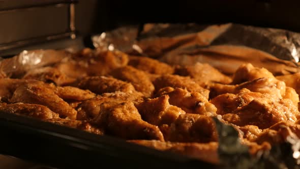 Chicken meat  baked and ready to beeing served  close-up 4K 2160p 30fps UltraHD panning footage - Bu