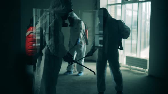 Coronavirus Pandemic, Virus Prevention, COVID-19 Concept. Sanitation Workers Are Spraying