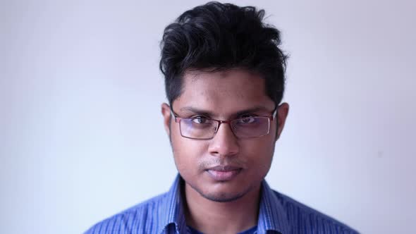 Young Man with Protective Face Mask Looking at Camera 