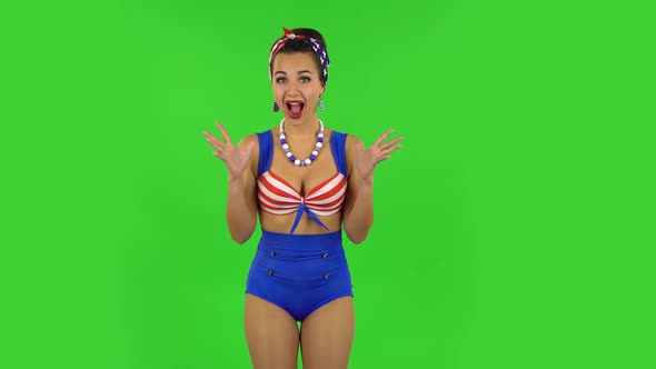 Beautiful Girl in a Swimsuit with Shocked Surprised Wow Face Expression. Green Screen