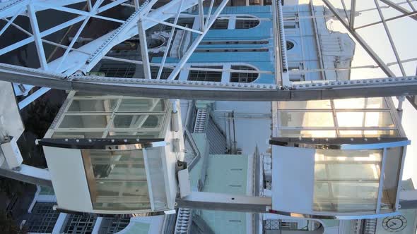 Vertical Video  Ferris Wheel in the Morning at Sunrise in Kyiv Ukraine