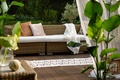 Rattan sofa on porch - PhotoDune Item for Sale