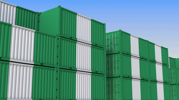 Container Yard Full of Containers with Flag of Nigeria