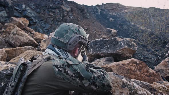 Special Forces Operator in Full Protection Gear with Assault Rifle