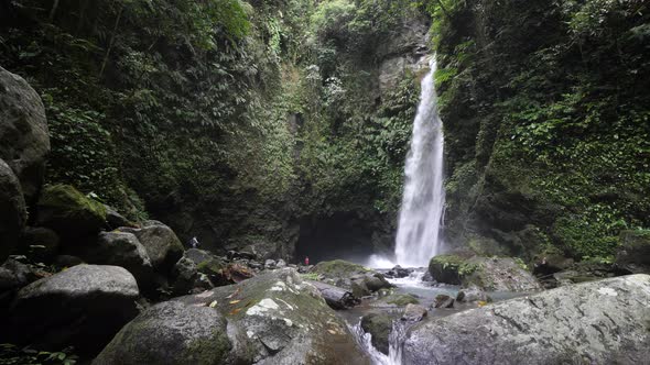 Amazing View of a Tropical Rainforest Waterfall in the Philippines with Few Tourist.