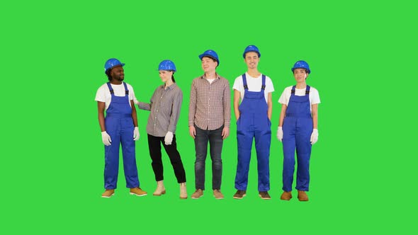 Group of Architects Engineers Workers at a Construction Site Smiling on Camera on a Green Screen