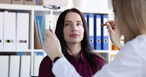 Ophthalmologist Doctor Conducts Medical Examination of Patient Eyes