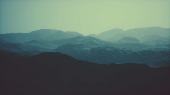 Landscape of the Dolomites Mountain Range Covered in the Fog