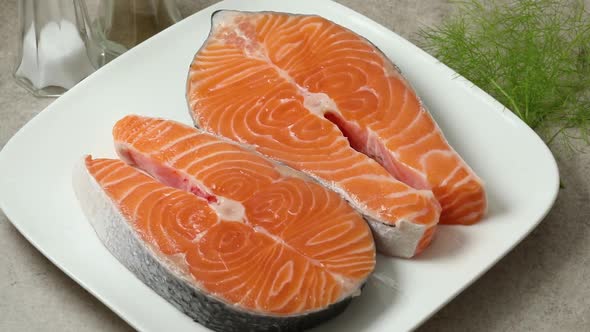 Fresh raw Scottish salmon steaks close up 