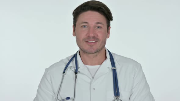 Video Chat By Serious Male Doctor, White Background