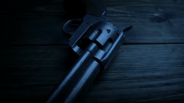 Six Shooter Gun In Dark Room