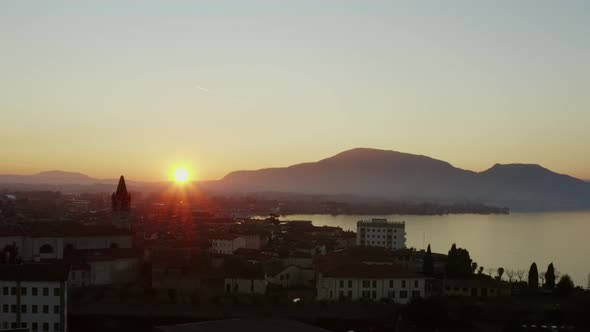 Arial shot of the sunset of Iseo Lake in wintertime Filmed on Dji Mavic pro 2 10 bit - 4:2:2