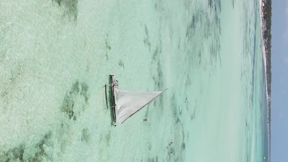 Tanzania Vertical Video  Boat Boats in the Ocean Near the Coast of Zanzibar Aerial View