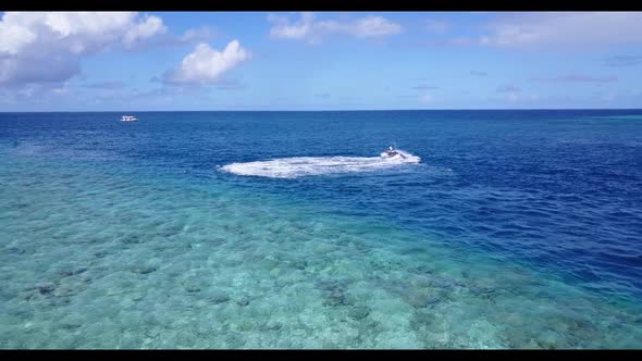 Aerial drone shot abstract of tropical sea view beach voyage by aqua blue water with white sand back