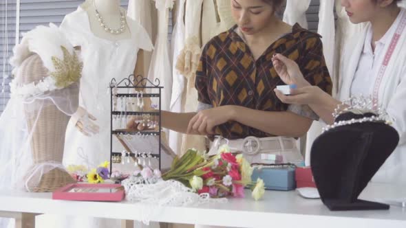 Future Bride Customer Talking with Wedding Store Shopkeeper