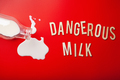 dangerous milk word text letters lactose intolerance allergy. milk splatter. avoid dangerous dairy - PhotoDune Item for Sale
