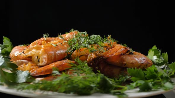 Dish with Delicious Roasted Shrimps and Dill with Parsley
