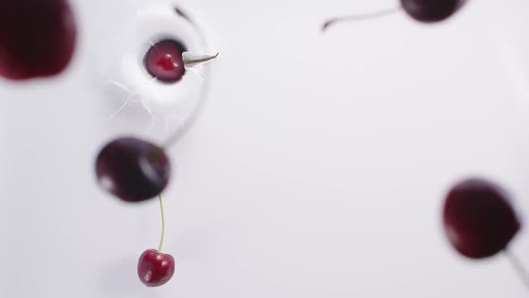 Cherries Falling Down to the Milk