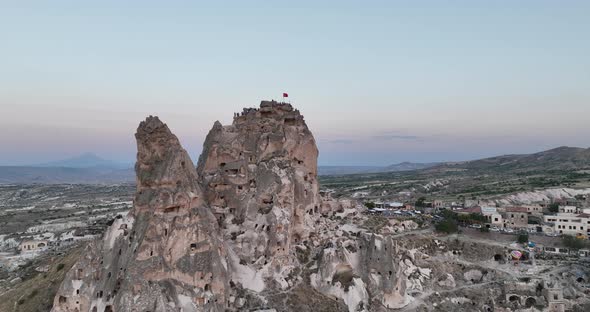 Aerial View of Natural Rock Formations in the Sunset Valley with Cave Houses in Cappadocia Turkey