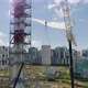 Chimney Pipe Construction, the Crane Lifts the Pipe Segment. Aerial Shot - VideoHive Item for Sale
