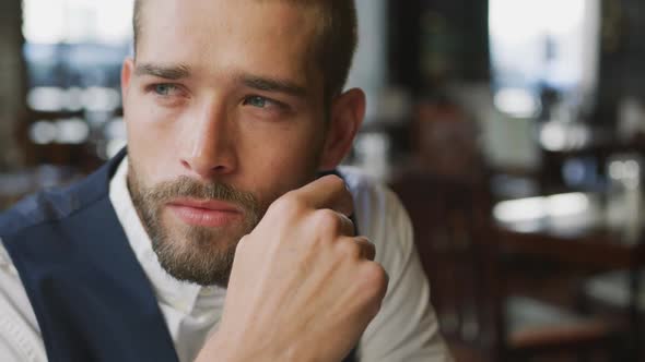 Young professional man in a cafe