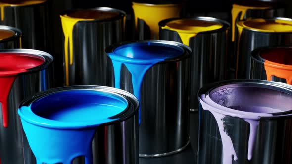 Colorful Paint of a Metal Bucket. Isolated on a Black Background.