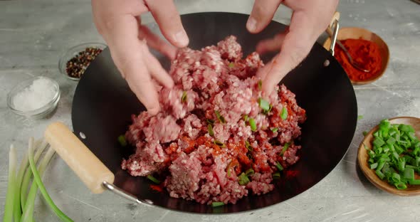 Cooking Men's Hands Mince for Raw Kebab Sausages. 