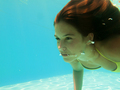 Young woman swimming undewater - PhotoDune Item for Sale