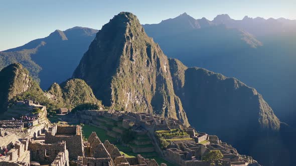 Pan From Sun Rise To Ancient Ruins On Mountainside