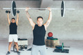 Fitness_young_men_doing_workout_routine - PhotoDune Item for Sale