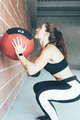 Fitness_woman_doing_wall_ball_routine - PhotoDune Item for Sale