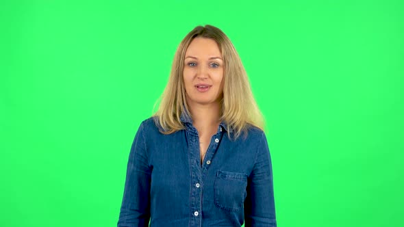 Portrait of Fair Woman Is Laughing. Green Screen