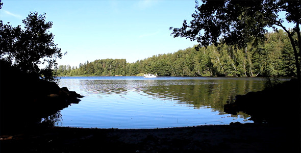 Boat Floating Between Islands
