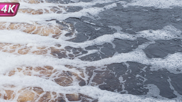 Stream Of Bubbling Foam Water