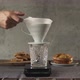 Man Wearing Green Pajama Making Coffee in Pourover - VideoHive Item for Sale