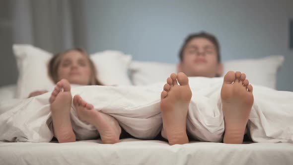 Sleeping Woman Scratching Her Foot, Couple Relaxing Bed, Antifungal Spray Effect