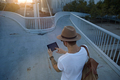 Man on pedestrian bridge with tablet - PhotoDune Item for Sale