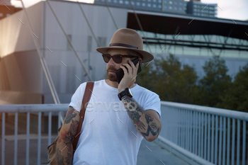 the phone on a bridge in a city office district