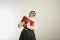 Overwhelmed teacher with heavy binders - PhotoDune Item for Sale