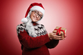 Woman in Christmas sweater and Santa hat with presents - PhotoDune Item for Sale