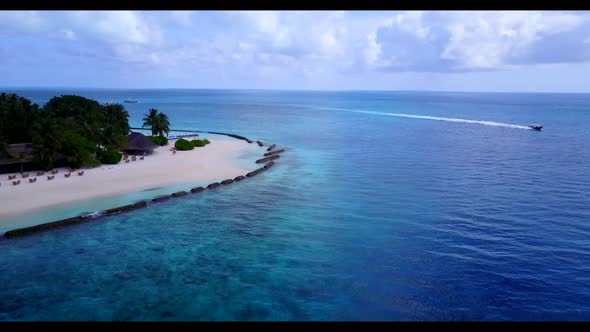 Aerial flying over nature of relaxing shore beach journey by turquoise sea with white sandy backgrou