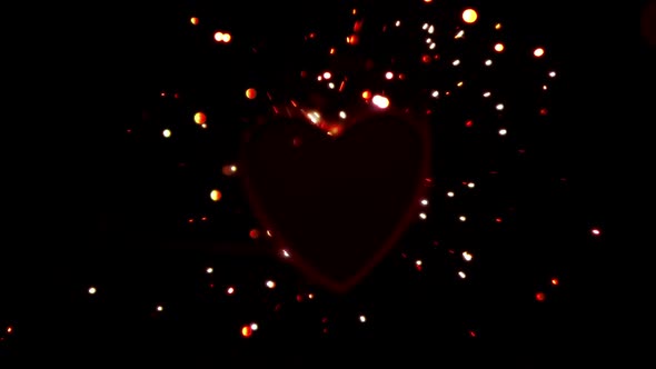 Sparks flying against a heart