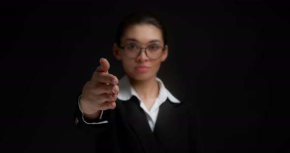 Confident Business Woman Shakes Hands to Make a Good Deal