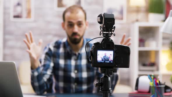 Creative Young Man Talking in Front of Camera