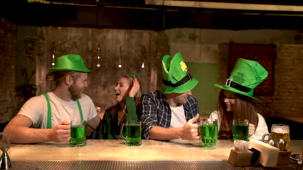 The company of young people celebrate St. Patrick's Day