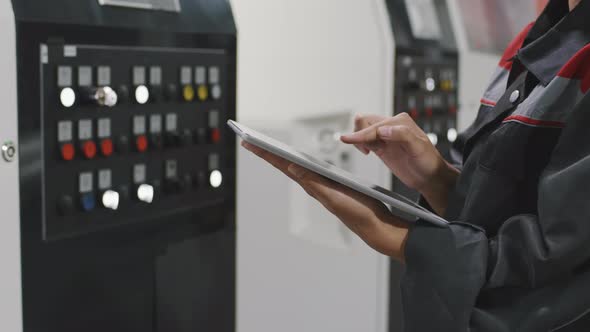 Female Plant Worker With Tablet