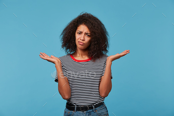 ow what to do, in confuses, with afro hairstyle isolated on a blue background