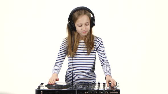 Teen Girl Dj in Headphones Plays for Console. White Background alt