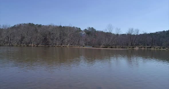 Flying Over the Chattahoochee River and Towards a Forest