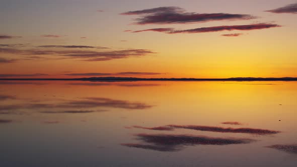 Sunrise reflection over the Great Salt Lake as water shimmers